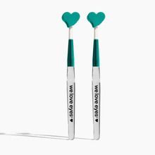 Load image into Gallery viewer, Two makeup brushes with heart-shaped ends on a white background, branded 'weloveeyes'.