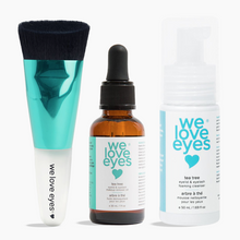 Load image into Gallery viewer, We Love Eyes skincare products including a brush, oil, and cleanser on a white background