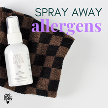 Load image into Gallery viewer, Spray bottle labeled 'we love eyes' on a checkered fabric with text 'Spray Away Allergens'.
