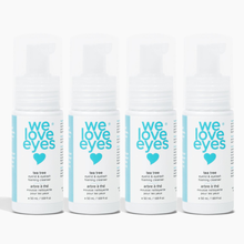 Load image into Gallery viewer, Four bottles of 'we love eyes' tea tree eye makeup removing foaming cleanser on a white background.