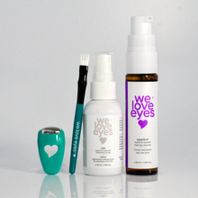 Load image into Gallery viewer, Set of eye care products with 'we love eyes' branding on a gray background
