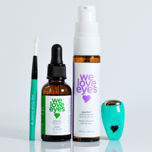 Load image into Gallery viewer, Set of 'we love eyes' skincare products including a dropper bottle, spray bottle, and applicator on a light gray background.
