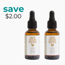 Load image into Gallery viewer, Two bottles of 'we love eyes' tea tree oil with a 'save $2.00' label on a white background.
