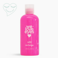 Pink bottle labeled 'we love eyes' on a white background